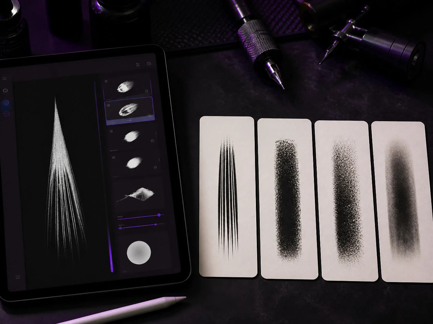 Custom tattoo brush laboratory with an iPad and four distinct brush stroke samples.